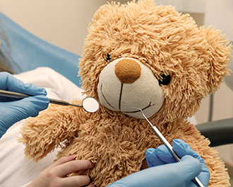 zahnarzt gesundheit kind teddy